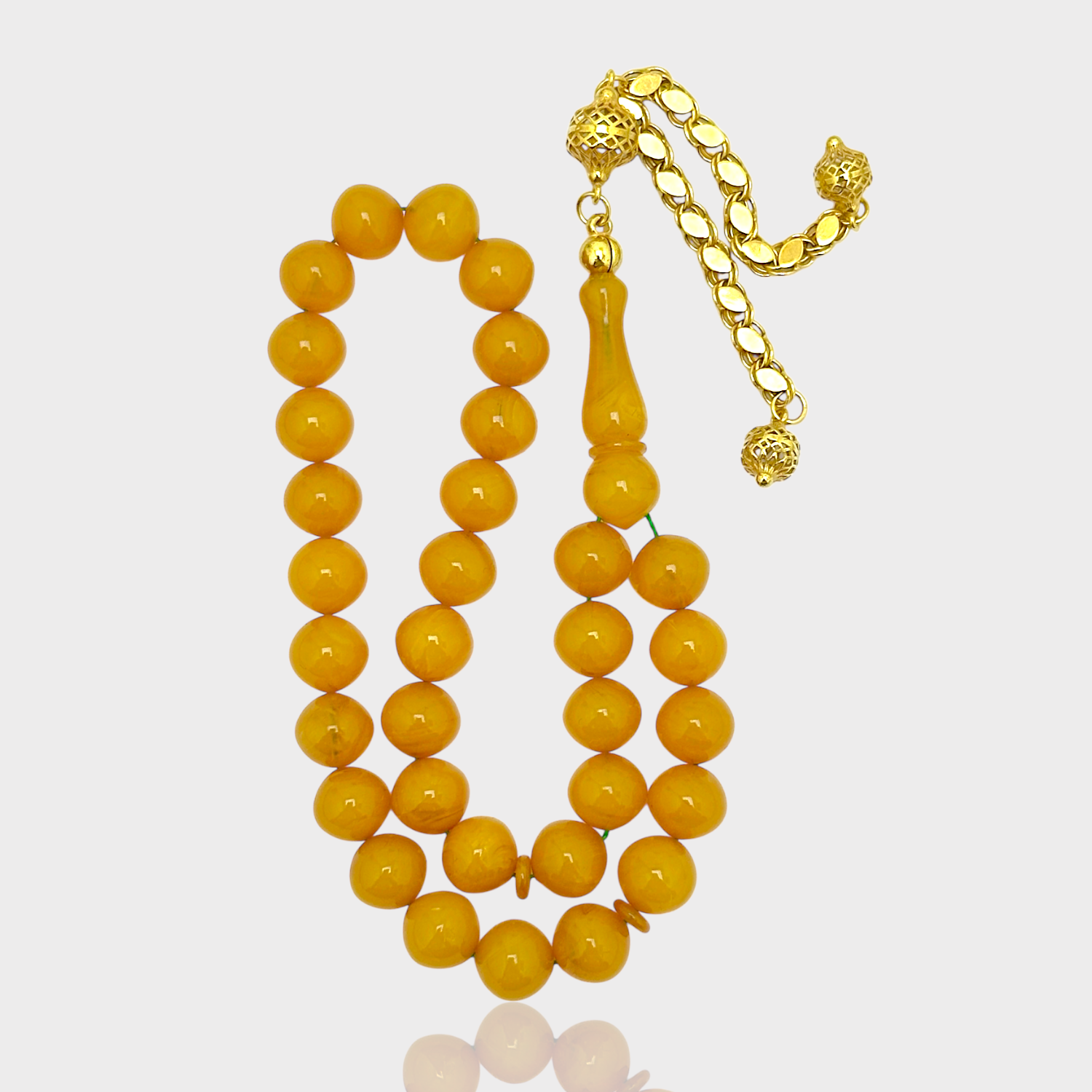 Altın Püsküllü Sığırcık Kesim Kehribar Tesbih